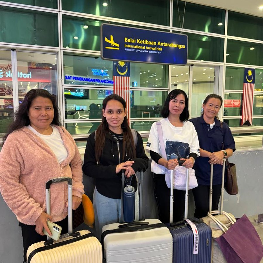 Helpers arriving at Kuala Lumpur International Airport